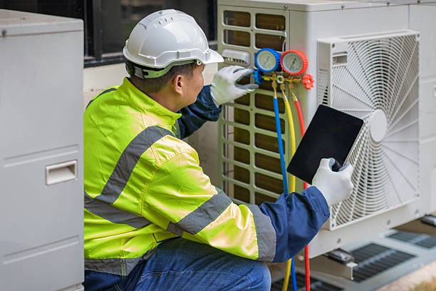 Professional Air Conditioning Repair technician working in Winamac, IN
